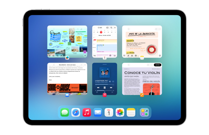 Un iPad, posición horizontal, la pantalla muestra varias apps como Calendario y Música dispuestas en un mosaico de seis ventanas dispuestas en dos filas de igual tamaño