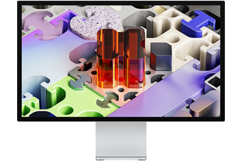 Vue avant du Studio Display XDR affichant un fond d’écran tridimensionnel de type puzzle