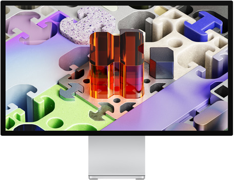 Bagian depan Studio Display XDR dengan wallpaper seperti puzzle tiga dimensi