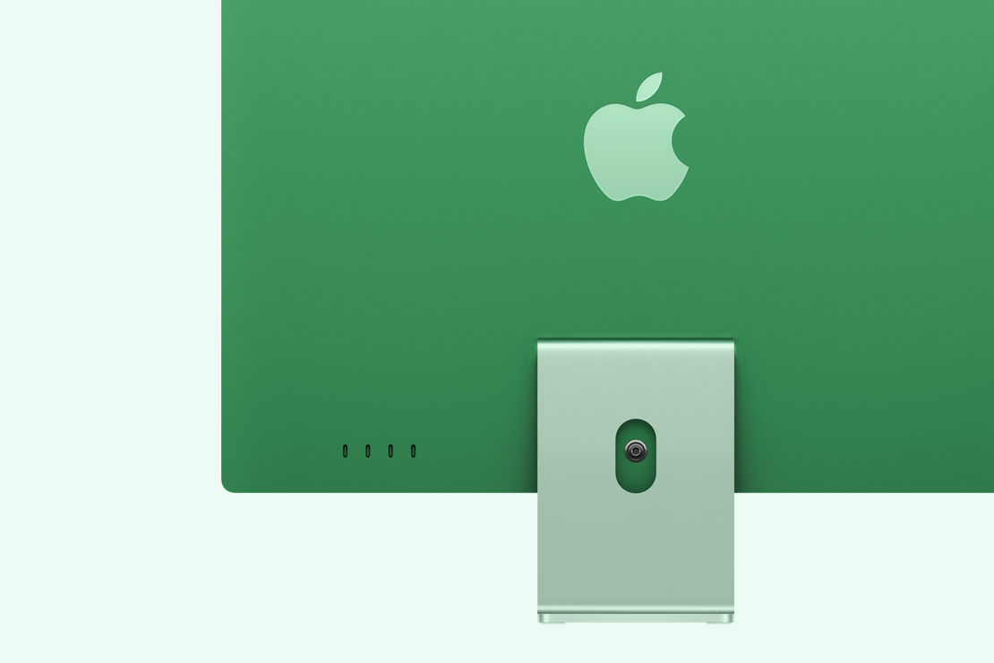 Vista posterior de un iMac verde, que destaca los cuatro puertos USB-C