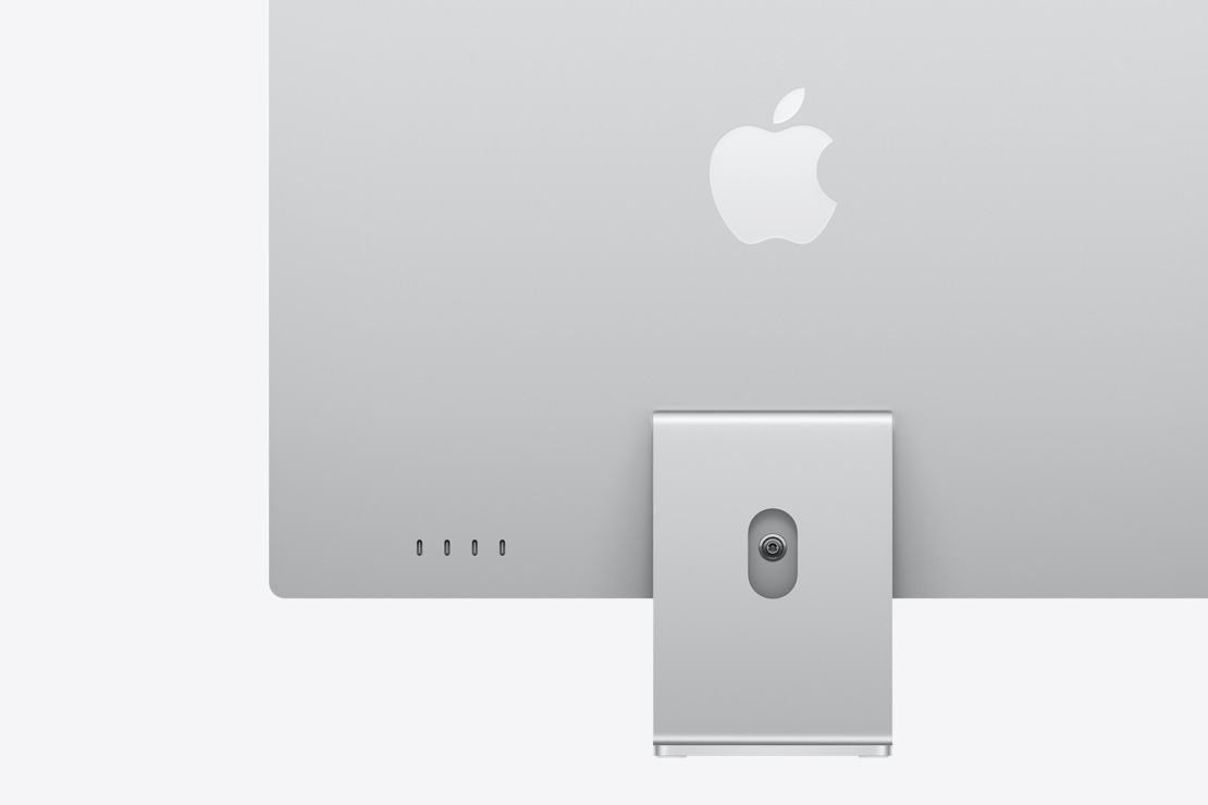 Vista posterior de un iMac color plata, que destaca los cuatro puertos USB-C