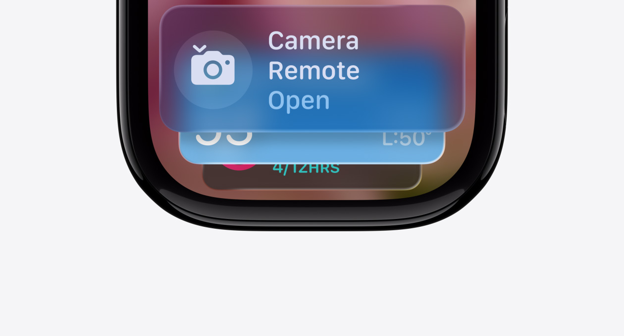 Apple Watch in Jet Black with no strap, face shows Smart Stack hint indicator