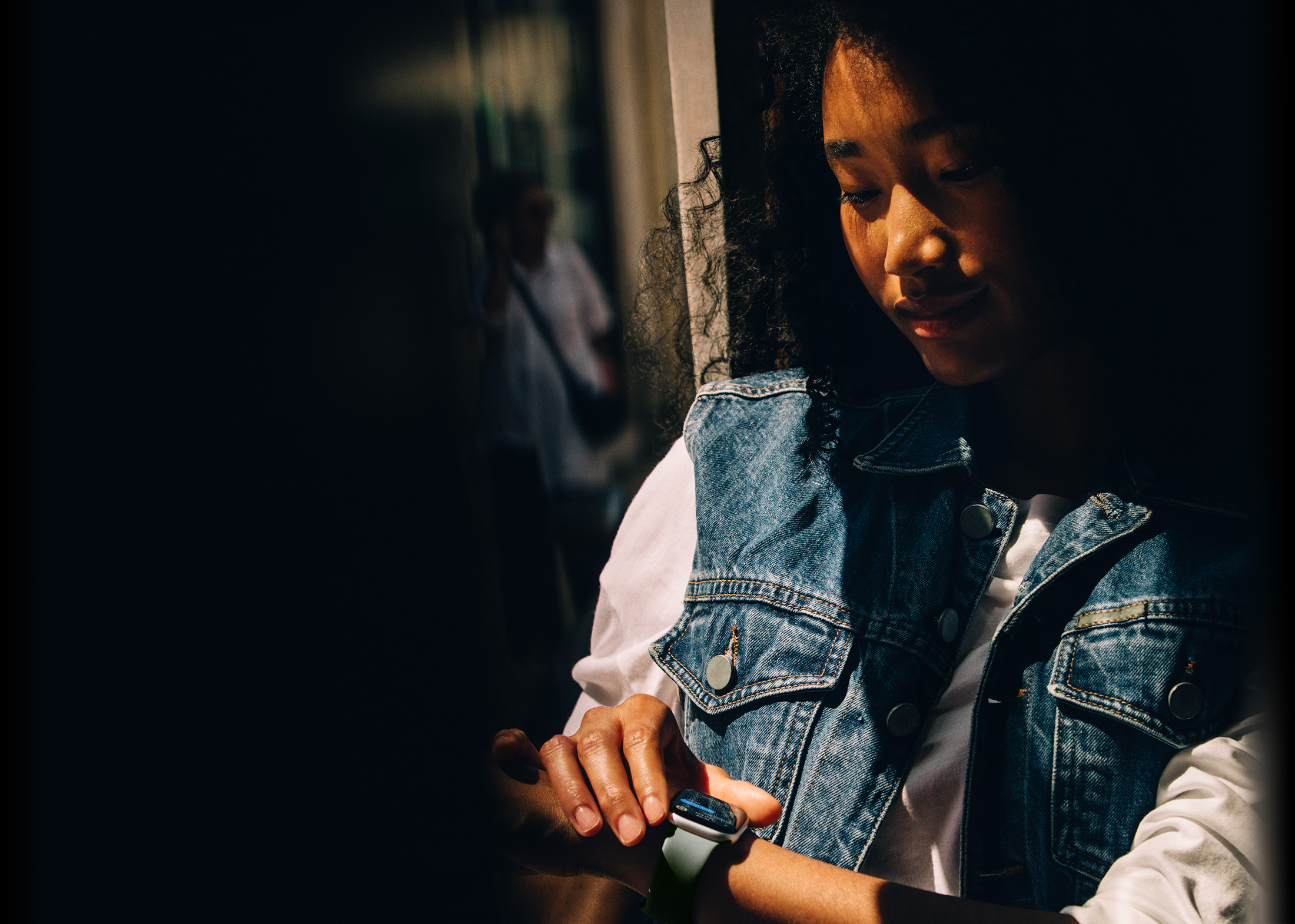 A person checks Messages on Apple Watch Series 11